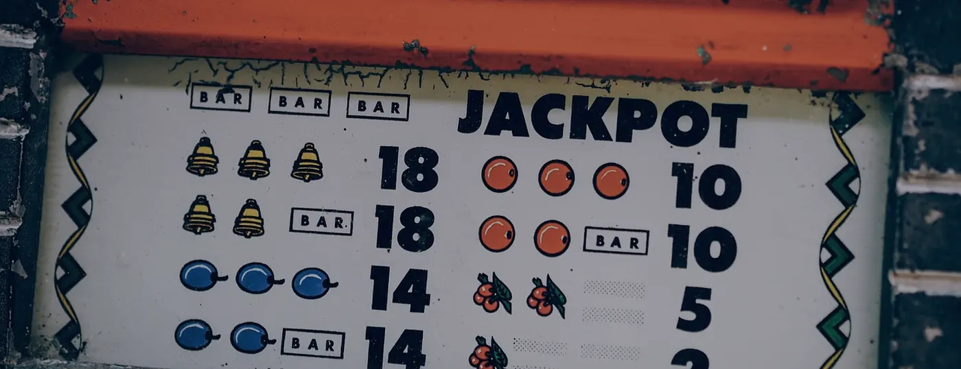 The paytable of a vintage slot machine, marked JACKPOT